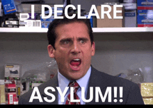 a man in a suit and tie with his mouth open and the words i declare asylum