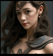 a woman in a wonder woman costume is wearing a crown and earrings