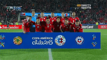 a group of soccer players are posing for a photo in front of a sign that says copa america chile 2015