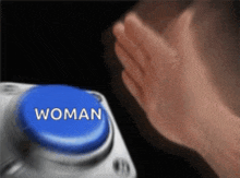 a blue button that says woman on it