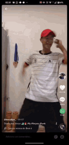 a screenshot of a tiktok video shows a man dancing