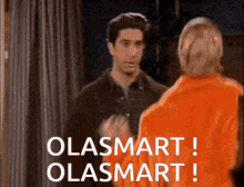 a man and a woman are standing next to each other with the words " olasmart " on the bottom