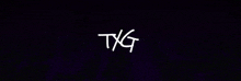 a black background with the letters txg written in white