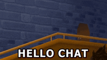 a sign that says hello chat on it in front of a brick wall