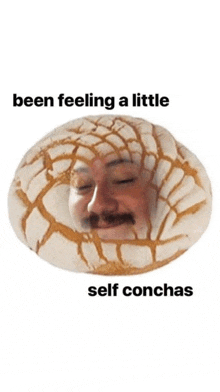 a man with a mustache is sitting in a concha