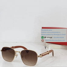 a pair of sunglasses sitting on top of a white table