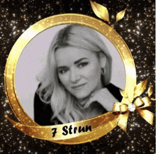 a picture of a woman in a gold frame with the name 7 strun