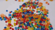 a pile of colorful water beads on a table