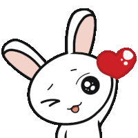 a cartoon bunny is holding a red heart in front of its face .