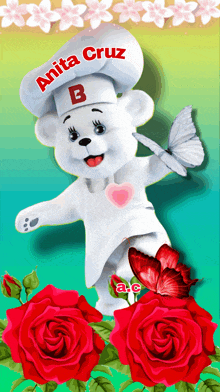 a teddy bear wearing a chef 's hat with the letter b on it