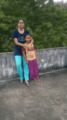 a woman wearing a shirt that says ' i love you ' on it