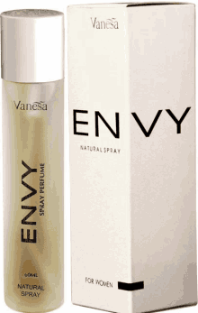 a bottle of envy natural spray perfume next to its box