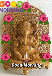 a statue of ganesha is surrounded by pink flowers and the words good morning on the bottom