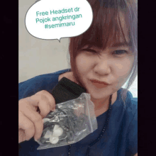 a woman holding a bag of earbuds with a speech bubble that says free headset