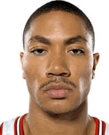 a close up of a man 's face with a mustache and a white background .