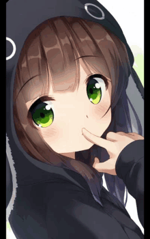 a girl with green eyes is wearing a hoodie with bunny ears