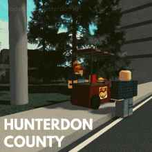 a hunterdon county advertisement with a hot dog cart