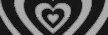 a black and white optical illusion with hearts in a circle .