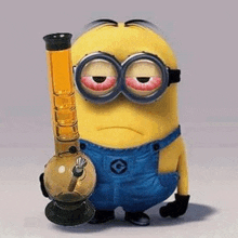 a minion is holding a bong with a sad face on his face .