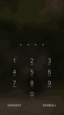 a phone screen shows the numbers 1 through 9 and the word darurat at the bottom