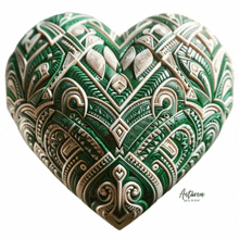 a green and white heart with autumna written on the bottom right