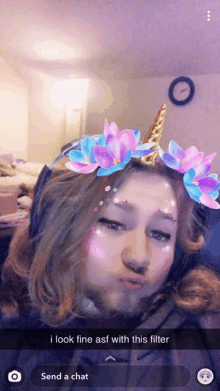 a picture of a girl with a unicorn filter on her face