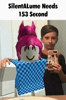 a boy is taking a selfie with a roblox character in front of him .