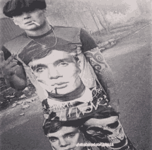 a black and white photo of a man wearing a shirt with a picture of a man smoking a cigarette