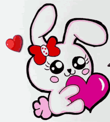 a drawing of a bunny with a red bow holding a heart