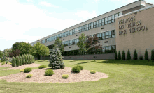 kenmore east senior high school is a large building with a lot of windows