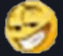 a blurry picture of a yellow smiley face with a big smile on it .