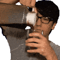 a man wearing glasses is pouring a drink from a bottle into a glass