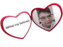 a heart shaped mirror says mihai my beloved on it