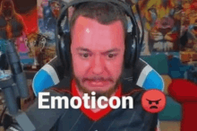 a man wearing headphones is crying in front of a microphone and a red emoji .