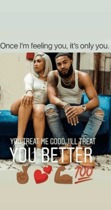 a man and a woman are sitting on a blue couch . the man is talking to the woman .