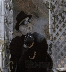 a man wearing a top hat and goggles smoking a cigarette in front of a blue ray sign