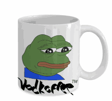 a coffee mug with a frog on it and the word volkoffee