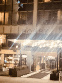 a blurry picture of a building with the word boopy on it