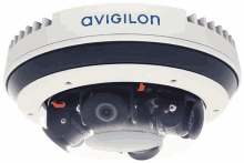 a white and blue avigilon camera against a white backdrop