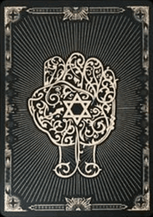 a black and gold tarot card with a hamsa hand and a star on it .