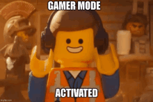 a lego man wearing headphones with the words gamer mode activated written on it