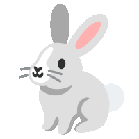 a gray rabbit with a pink ear is sitting down