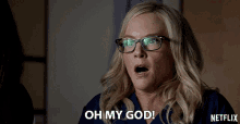 a woman with glasses says oh my god in a netflix ad