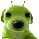 a green stuffed dog with antennas on its head is laying down and looking at the camera .