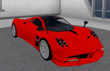 a red sports car is parked in a room with a metal floor