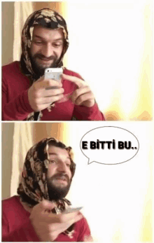 a man with a scarf around his head is looking at a cell phone and says e bitti bu .