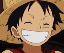 a close up of a person wearing a straw hat smiling