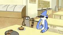 a regular show cartoon character is sitting at a table with a plate of pancakes .