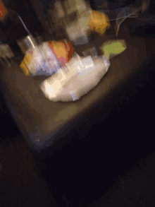 a blurred image of a table with a few bags of food