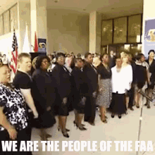 a group of people standing in front of a microphone with the words we are the people of the faa on the bottom